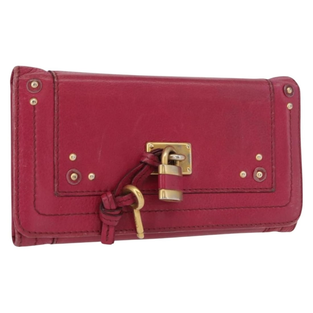 Pink Leather Chloe Paddington Long Wallet with Gold Accents: Pink Leather Chloe Paddington Long Wallet with Gold Accents This Chloe Paddington long wallet is crafted from pink leather with gold-tone accents. Made in Romania, it features multiple compartments fo
