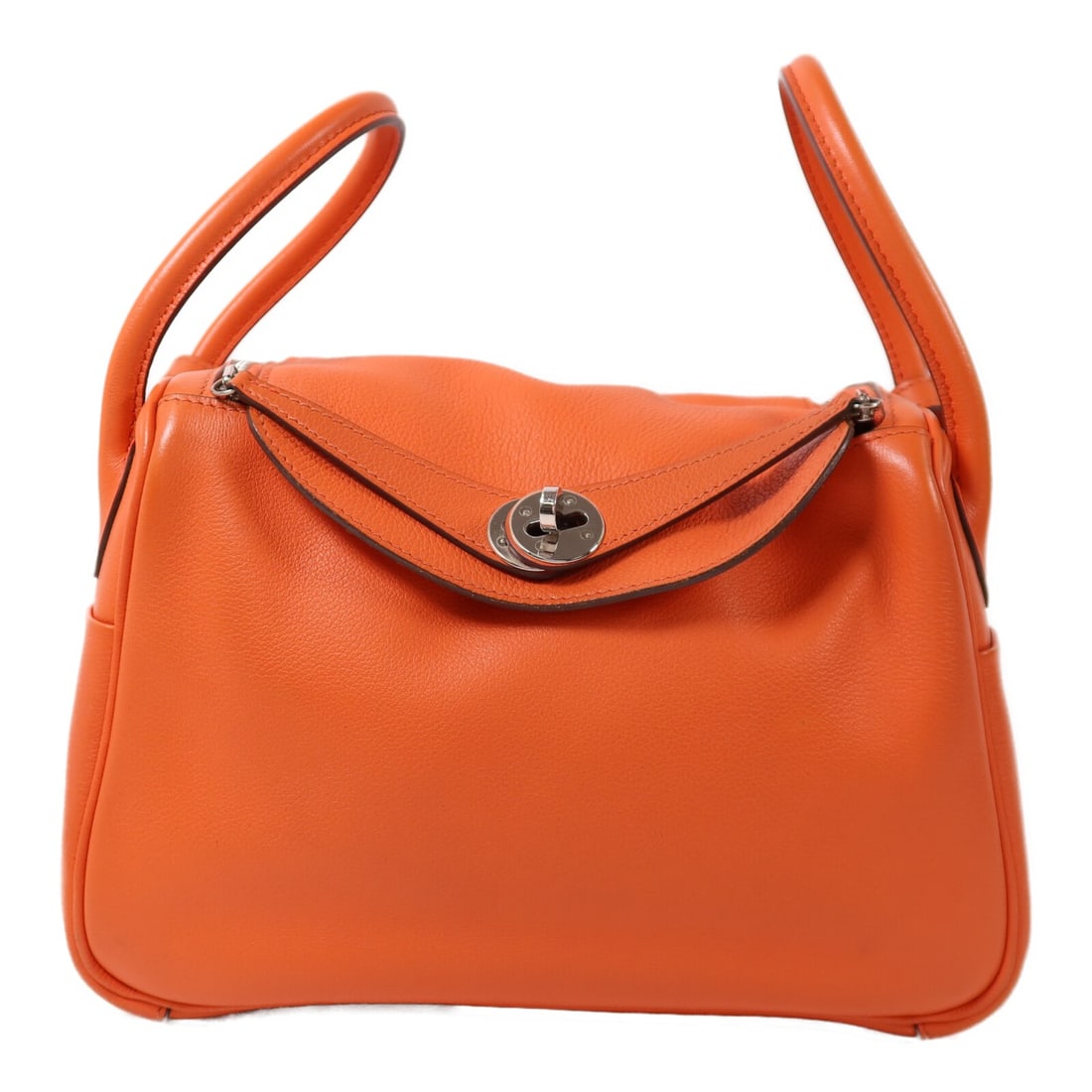 Hermes Lindy 26 Orange Evercolor Leather Shoulder Bag Palladium Hardware: Hermes Lindy 26 Orange Evercolor Leather Shoulder Bag Palladium Hardware This Hermes Lindy 26 is a versatile 2-way shoulder bag crafted from Evercolor calfskin leather in a striking orange poppy shade