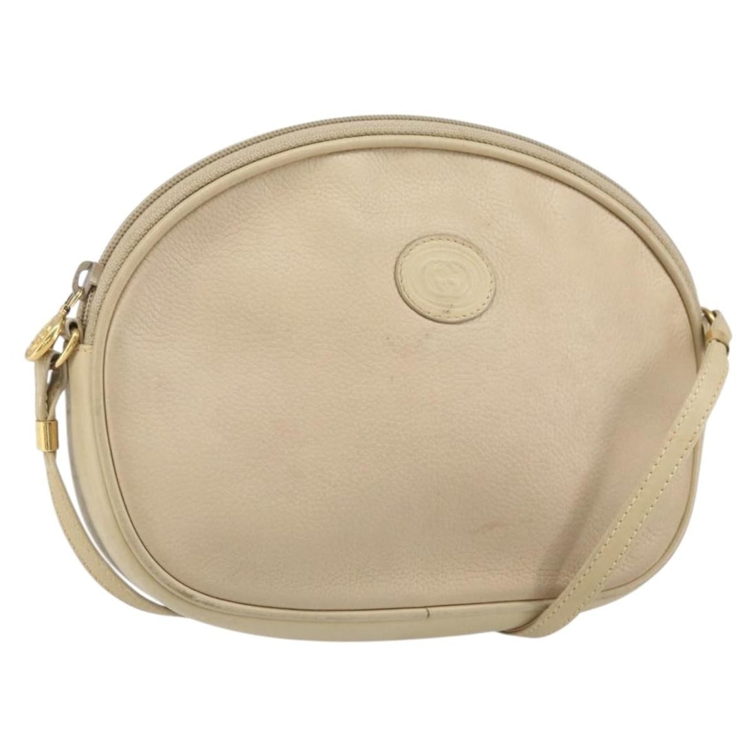 Beige Leather GUCCI 007 112 0094 Shoulder Bag Gold Accents: Beige Leather GUCCI 007 112 0094 Shoulder Bag Gold Accents This GUCCI shoulder bag is crafted from beige and gold leather, featuring a compact design with a flap closure. The bag shows significant sig