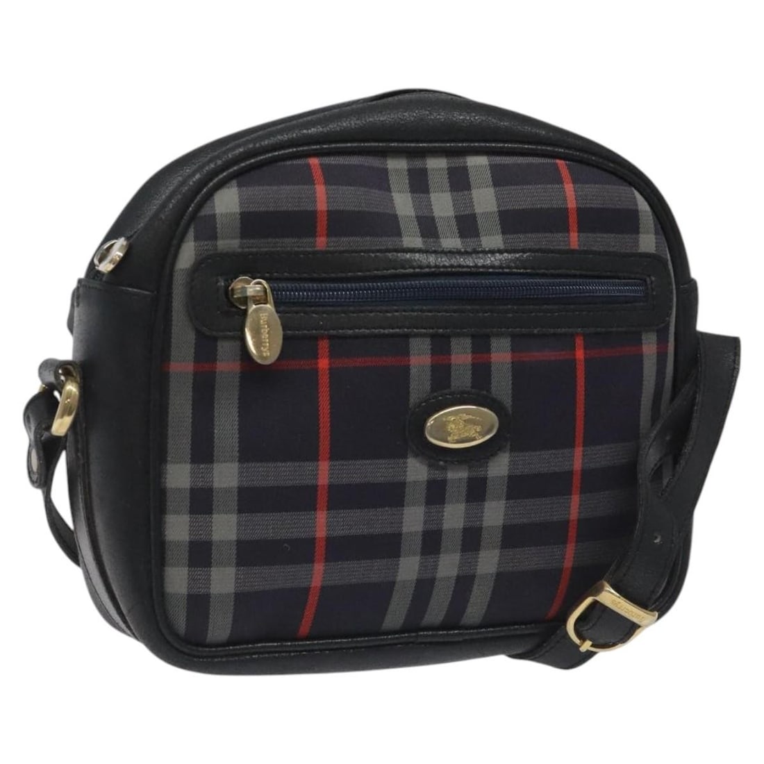 Burberrys Navy Canvas and Leather Women's Shoulder Bag Gold Accents: Burberrys Navy Canvas and Leather Women's Shoulder Bag Gold Accents This Burberrys shoulder bag features a navy and gold color scheme with canvas exterior and leather trim. Designed for women, the bag