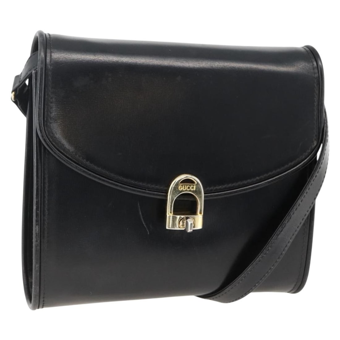 Black Leather GUCCI Shoulder Bag with Gold Accents for Women: Black Leather GUCCI Shoulder Bag with Gold Accents for Women This GUCCI shoulder bag is crafted from black leather with gold accents and is designed for women. The bag features a structured silhouette