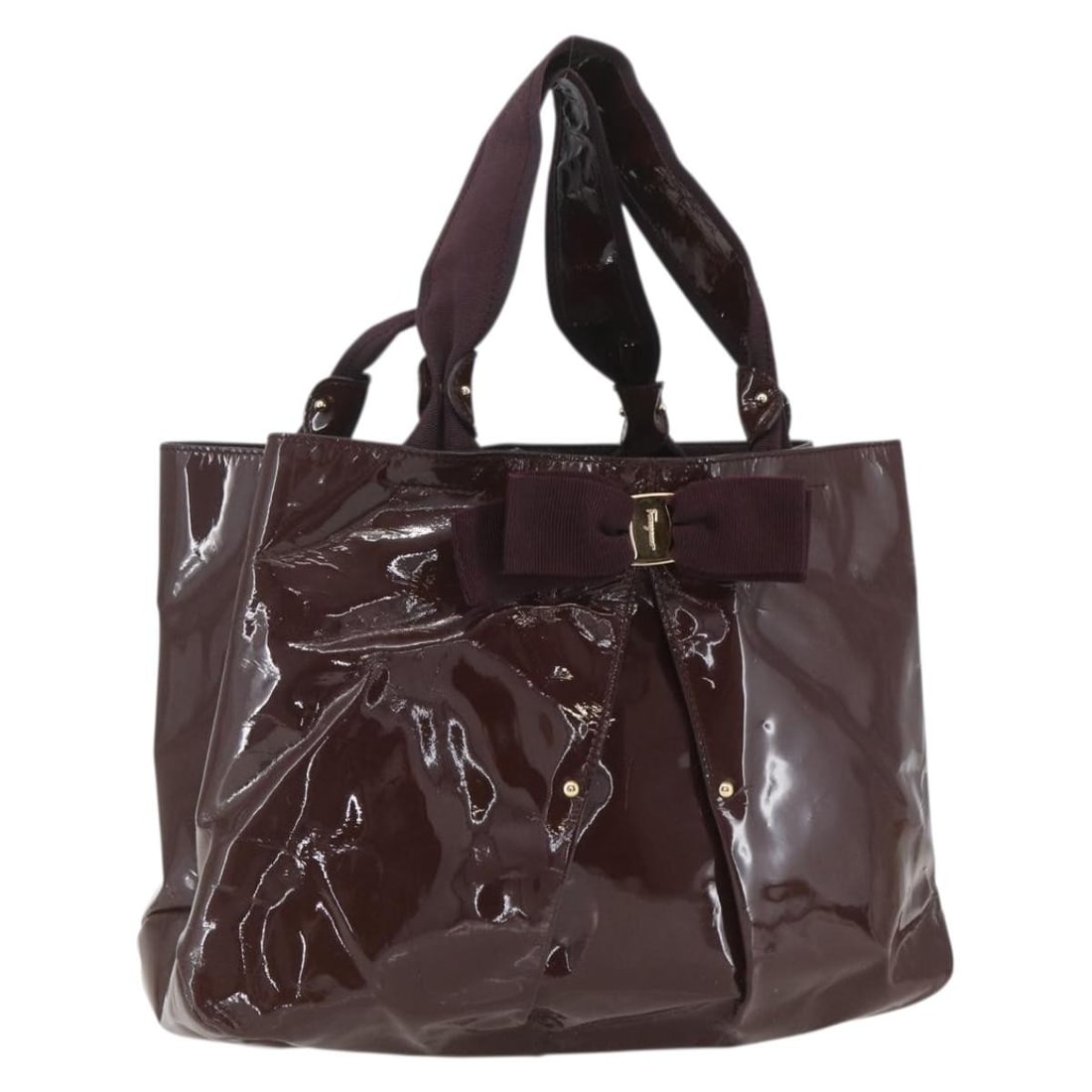Brown Patent Leather Salvatore Ferragamo Handbag with Gold Details: Brown Patent Leather Salvatore Ferragamo Handbag with Gold Details This Salvatore Ferragamo handbag is crafted from brown and gold patent leather and made in Italy. The bag shows heavy signs of use, i