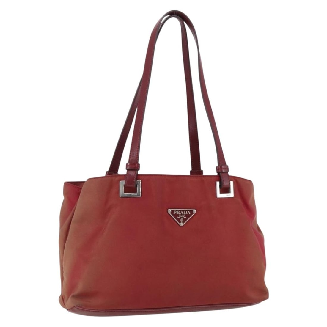 Red Nylon Prada Handbag with Silver Details and Guarantee Card: Red Nylon Prada Handbag with Silver Details and Guarantee Card This is a PRADA women's handbag crafted from red and silver nylon. The bag features a compact structure with a top handle and includes a