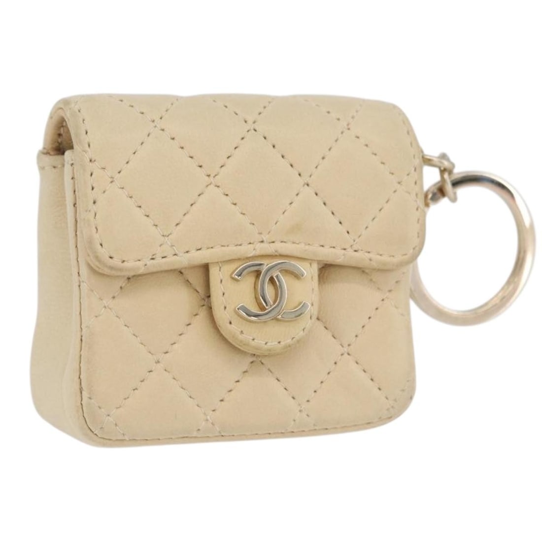 Chanel Beige Lambskin Matelasse Pouch with Gold CC France: Chanel Beige Lambskin Matelasse Pouch with Gold CC France This CHANEL Matelasse pouch is crafted from beige lambskin leather and features gold-tone CC accents. Designed for women, it is made in France