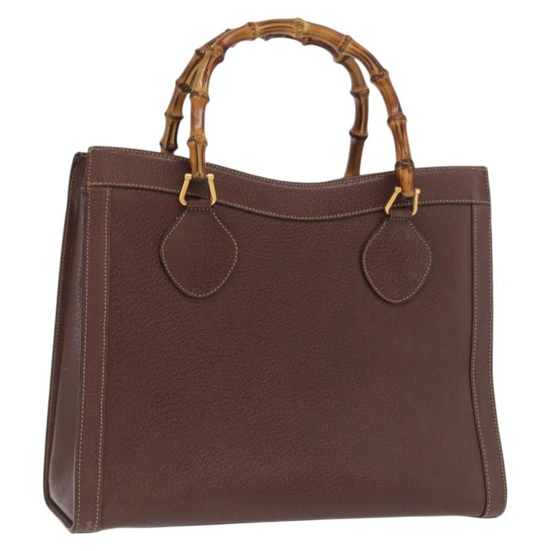 Black Leather Bamboo Handle Gucci Handbag with Gold Accents 002 1186 0260: Black Leather Bamboo Handle Gucci Handbag with Gold Accents 002 1186 0260 This GUCCI Bamboo handbag features black leather with gold-tone accents and a distinctive bamboo handle. The bag offers a spac