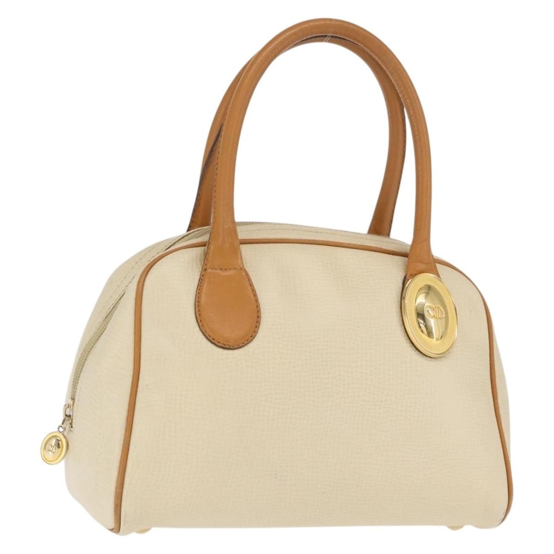 Ivory and Gold Christian Dior Leather Handbag with Charm: Ivory and Gold Christian Dior Leather Handbag with Charm This Christian Dior hand bag features an ivory and gold color combination with leather and lambskin materials. It comes with a charm accessory