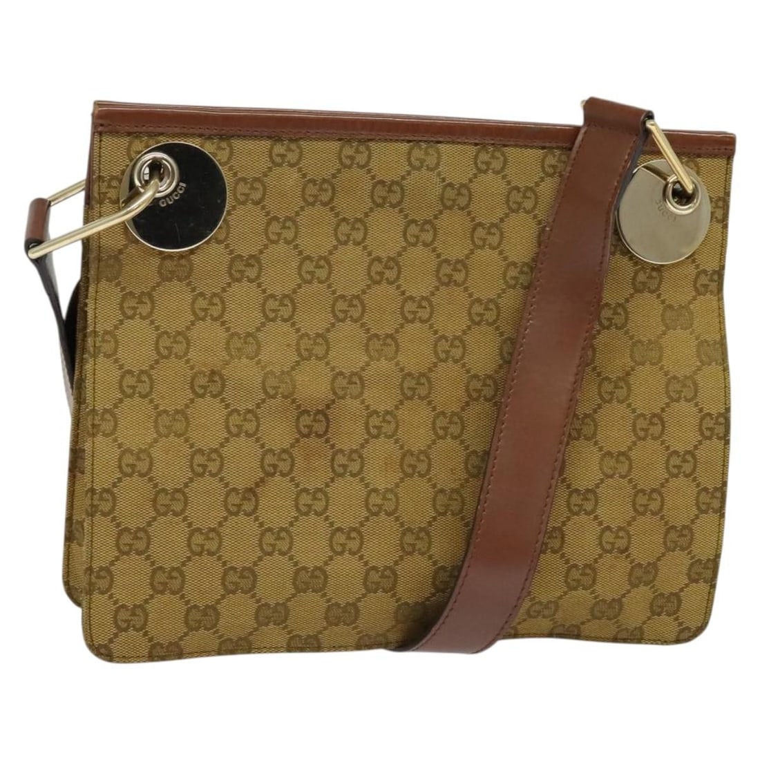 GUCCI GG Canvas Shoulder Bag Beige Gold Made in Italy: GUCCI GG Canvas Shoulder Bag Beige Gold Made in Italy This GUCCI GG Canvas Shoulder Bag combines elegance with practicality, featuring a sophisticated beige and gold color palette. Crafted in Italy fr