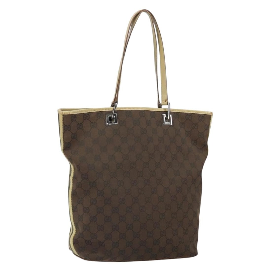 Dark Brown GG Canvas Gucci 31243 Tote Handbag Silver Accents: Dark Brown GG Canvas Gucci 31243 Tote Handbag Silver Accents This GUCCI GG Canvas Tote Bag features a dark brown and silver color scheme and is crafted from GG Canvas material. The tote is designed wi