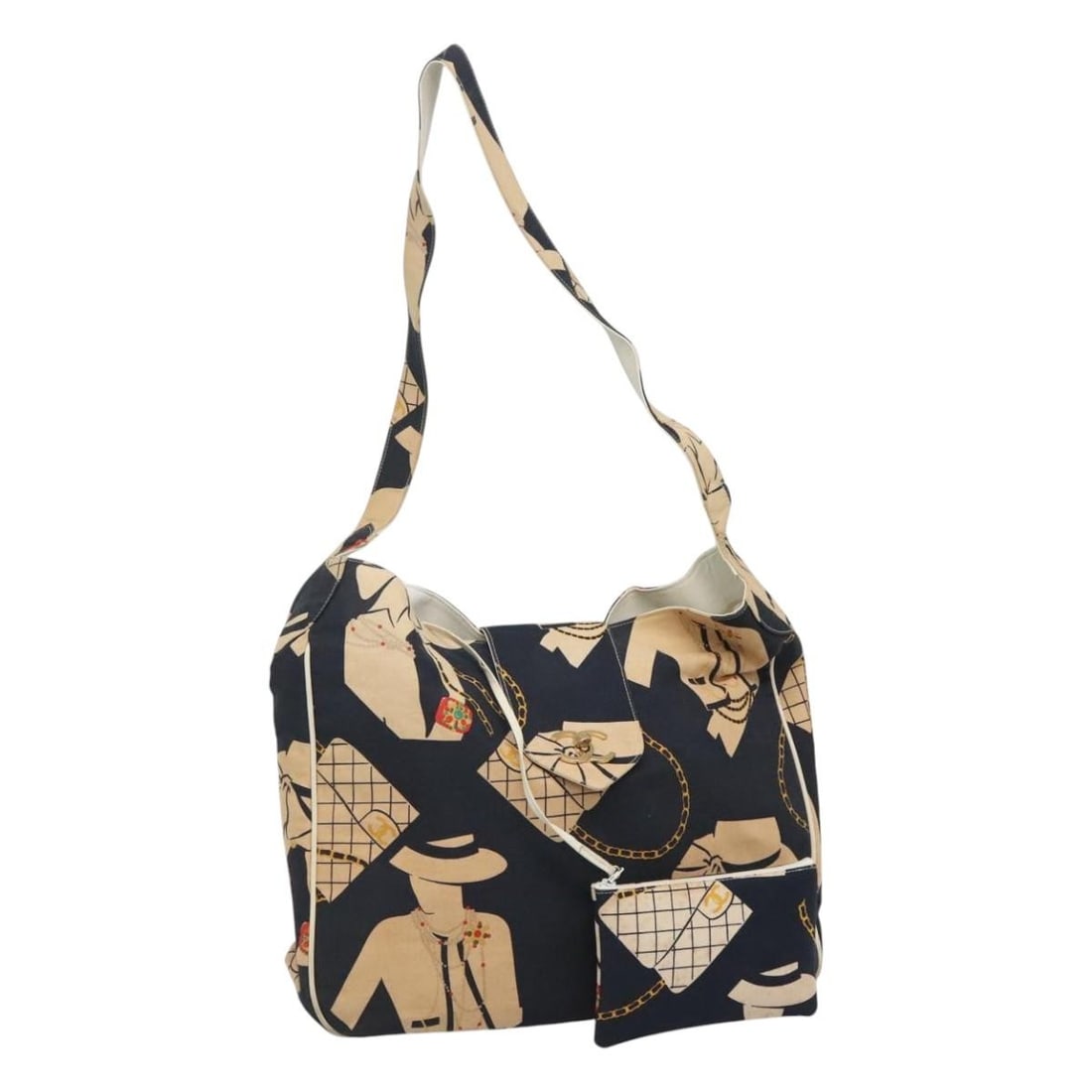 Navy Canvas Mademoiselle Tote with CC Logo by CHANEL: Navy Canvas Mademoiselle Tote with CC Logo by CHANEL This CHANEL Mademoiselle tote bag features a navy canvas exterior with classic CC accents. Designed for women, it offers a spacious interior and in