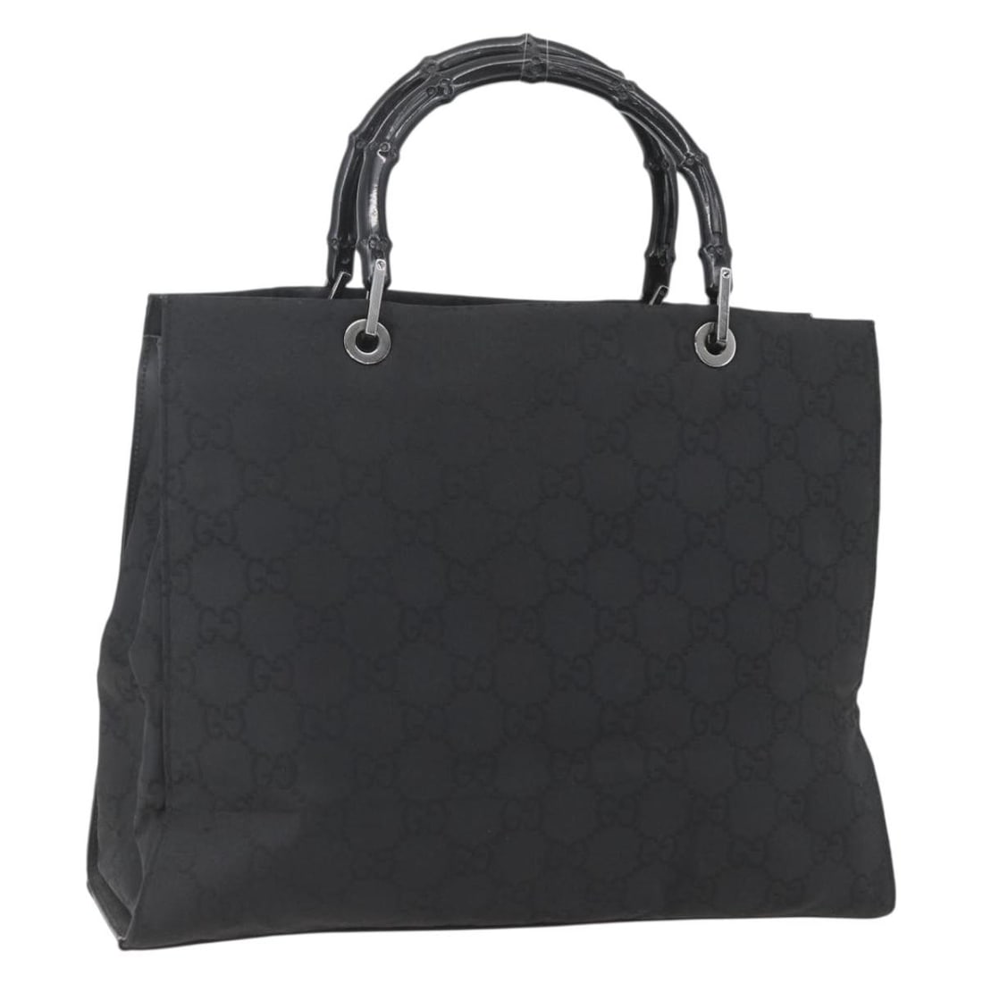 Gucci Bamboo Nylon Black Handbag GG Canvas 002 1010 Italy: Gucci Bamboo Nylon Black Handbag GG Canvas 002 1010 Italy This is a GUCCI GG Canvas Bamboo hand bag crafted from black nylon and GG canvas with silver-tone accents. The bag features a bamboo handle, a
