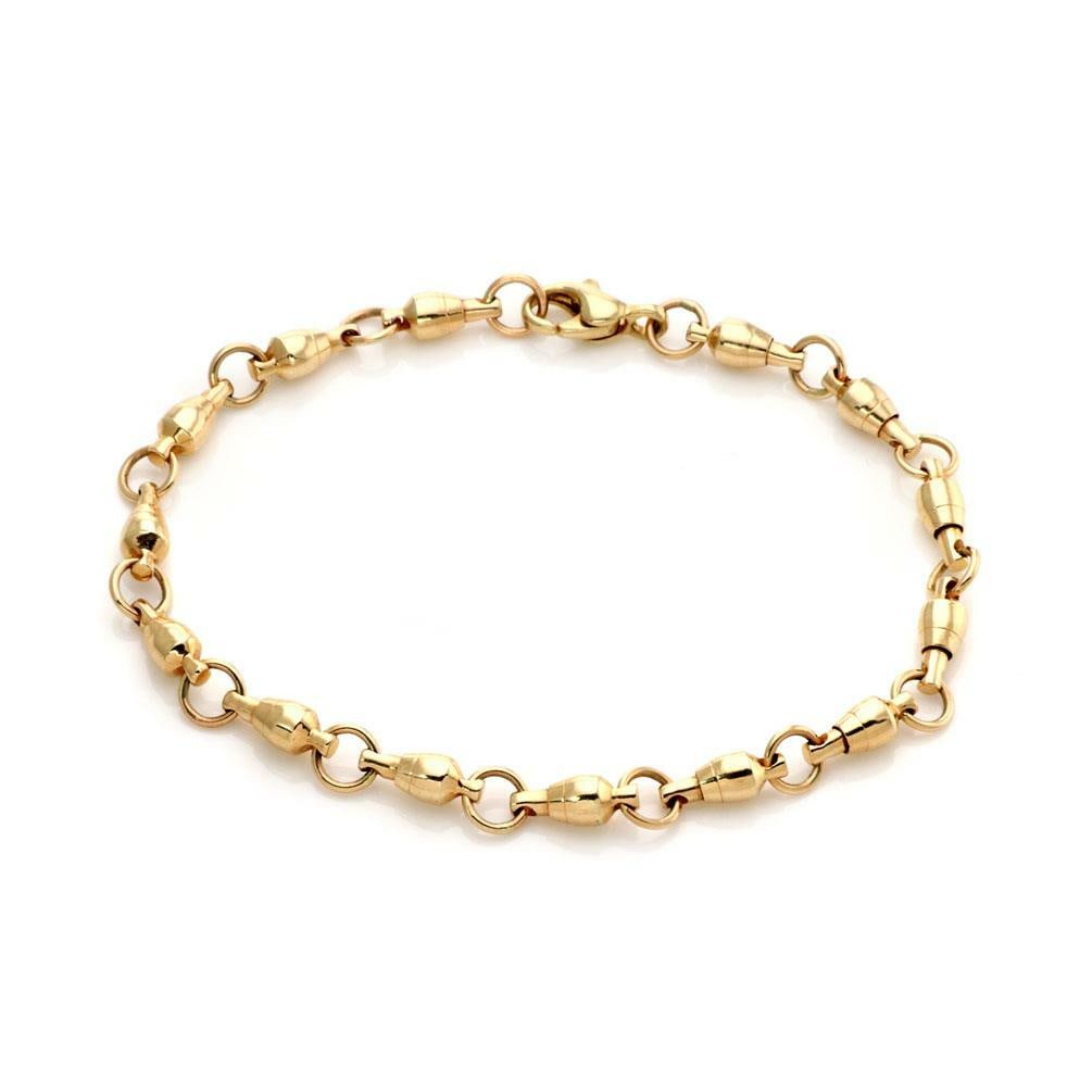 Vintage 14k Yellow Gold Space Capsule Link Bracelet 8 Inch: Vintage 14k Yellow Gold Space Capsule Link Bracelet 8 Inch This exquisite vintage bracelet is crafted from 14k yellow gold and features unique chamber-style links designed in the shape of a vintage sp