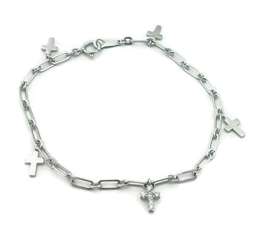 Charm Bracelet with Diamond Crosses in 18k White Gold by Vendome: Charm Bracelet with Diamond Crosses in 18k White Gold by Vendome This Vendome charm link bracelet is crafted from solid 18k white gold and features cross-shaped charms adorned with diamonds. The refin