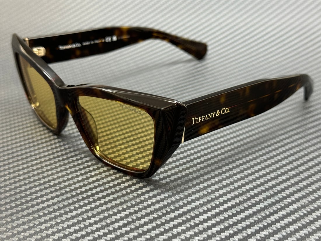 Tiffany TF4230 8015 7 Havana Yellow Women's Sunglasses with Authenticity: Tiffany TF4230 8015 7 Havana Yellow Women's Sunglasses with Authenticity Elevate your style with these exquisite Tiffany & Co. TF4230 8015 7 Havana Yellow Women's Sunglasses. Featuring a sophisticated