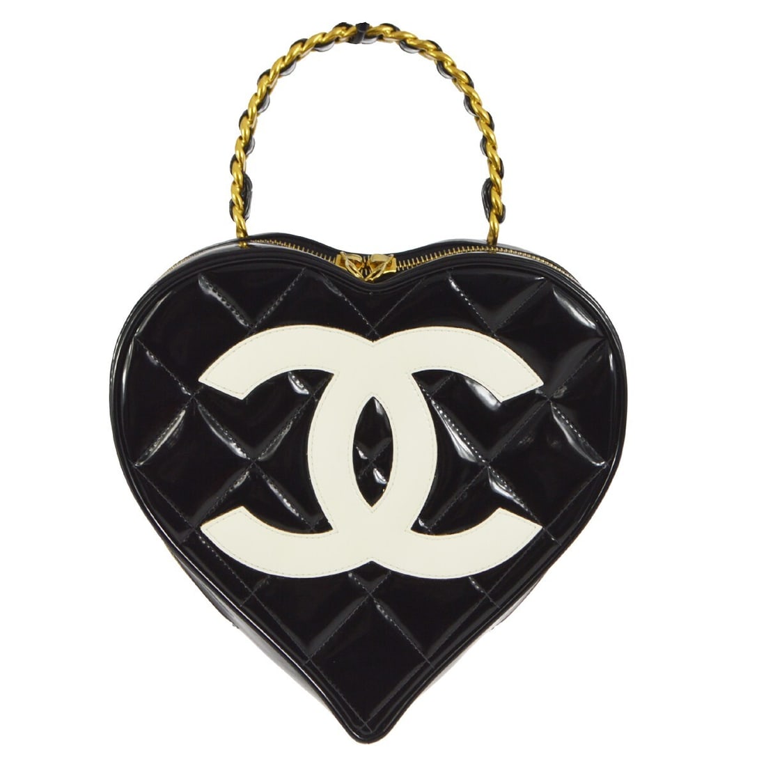 Chanel Quilted Black Heart Vanity Handbag with Leather Lining: Chanel Quilted Black Heart Vanity Handbag with Leather Lining Introducing the Chanel Black Heart Vanity Handbag, a stylish and versatile accessory perfect for casual parties or cocktails. This medium-