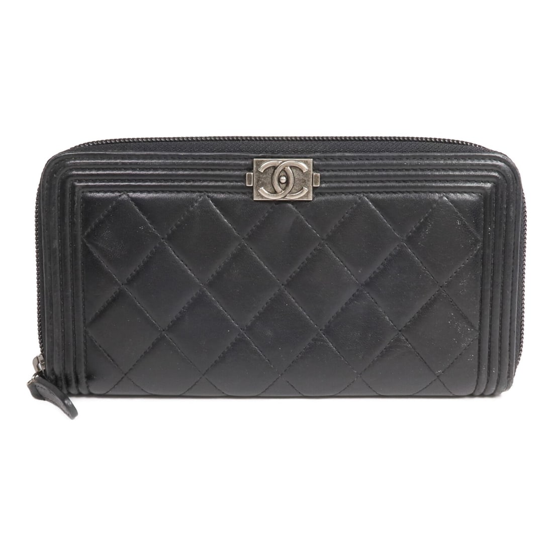 Black Lambskin Boy Long Wallet by CHANEL with Silver Hardware: Black Lambskin Boy Long Wallet by CHANEL with Silver Hardware This Chanel Boy long wallet features luxurious black lambskin leather and a classic design with silver-tone hardware. Made in France, it i