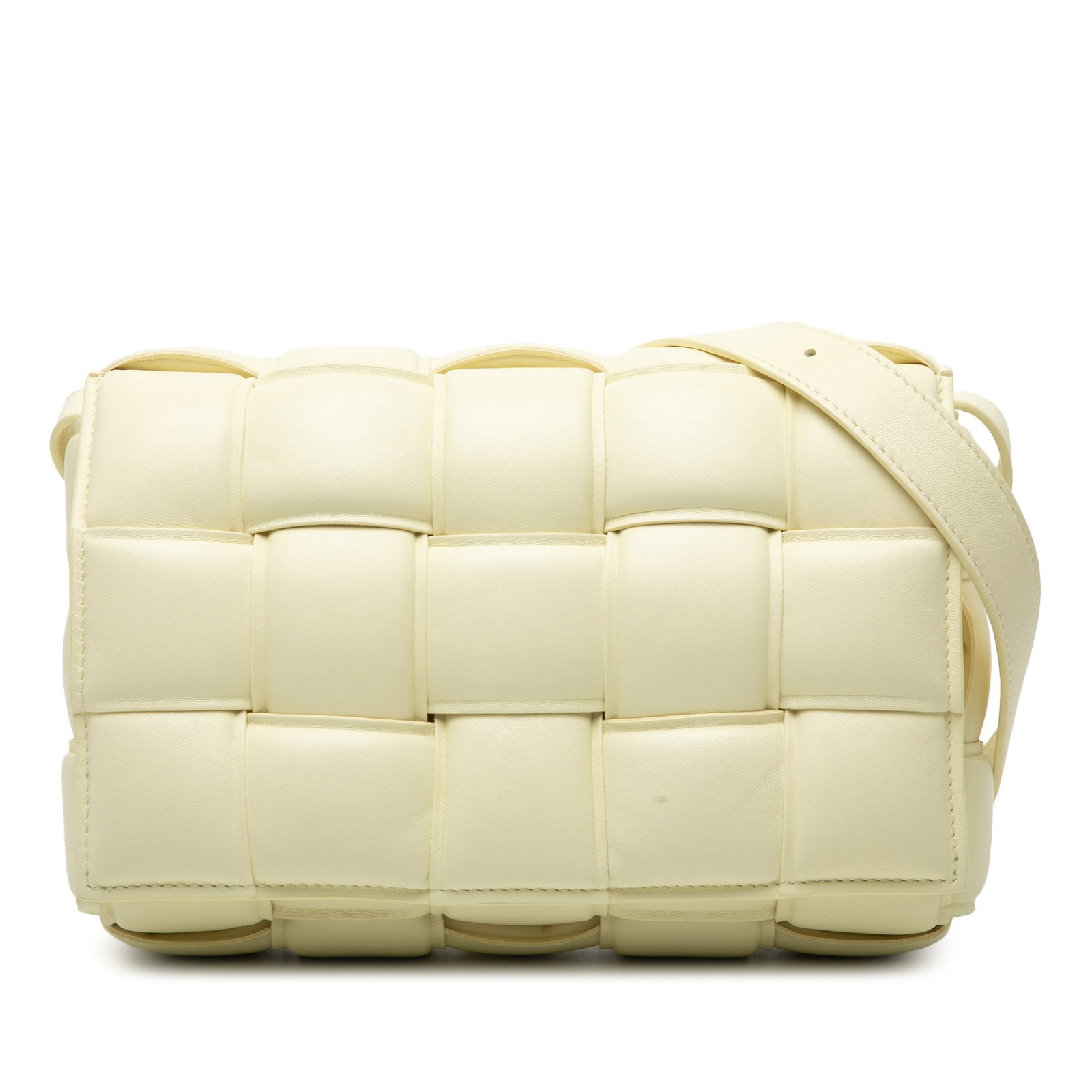 Yellow Nappa Leather Padded Cassette Crossbody Bag by Bottega Veneta: Yellow Nappa Leather Padded Cassette Crossbody Bag by Bottega Veneta This Bottega Veneta Padded Cassette crossbody bag features the signature Intrecciato woven nappa leather in a vibrant yellow. It is