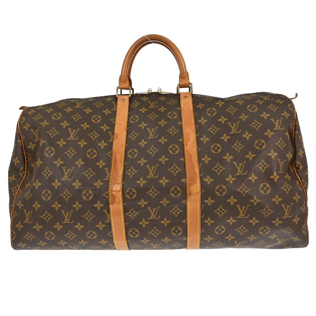 Keepall Unisex Travel Bag by Louis Vuitton in Monogram Canvas: Keepall Unisex Travel Bag by Louis Vuitton in Monogram Canvas This Louis Vuitton Keepall Bag features the iconic brown Monogram canvas and is designed for unisex use. The bag is in fair, used conditio