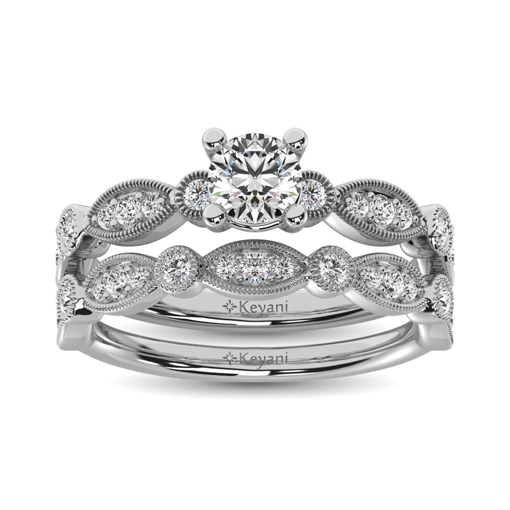 Diamond 1 Ct.Tw. Bridal Ring in 14K White Gold: Diamond 1 Ct.Tw. Bridal Ring in 14K White Gold 14k White Gold Stone Color: G-h Stone Clarity: Si2 Each ring is presented in standard size 6.5. Complimentary resizing is available between sizes 510 (in