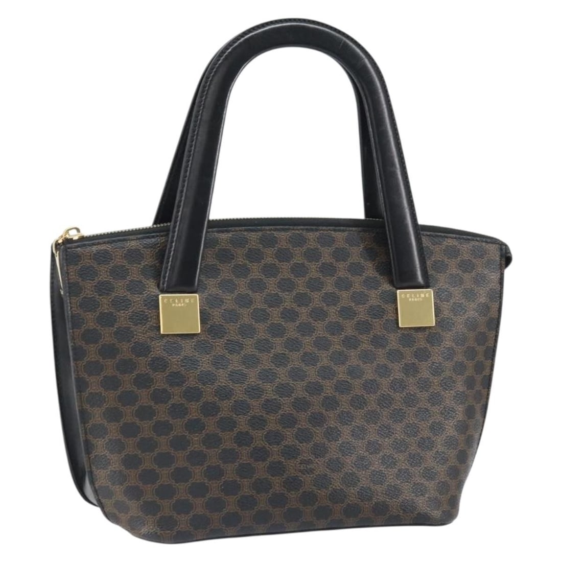 Celine Macadam Black PVC Leather Handbag with Gold Accents: Celine Macadam Black PVC Leather Handbag with Gold Accents This CELINE Macadam Canvas hand bag features a stylish combination of black and gold tones with PVC leather and the signature Macadam canvas