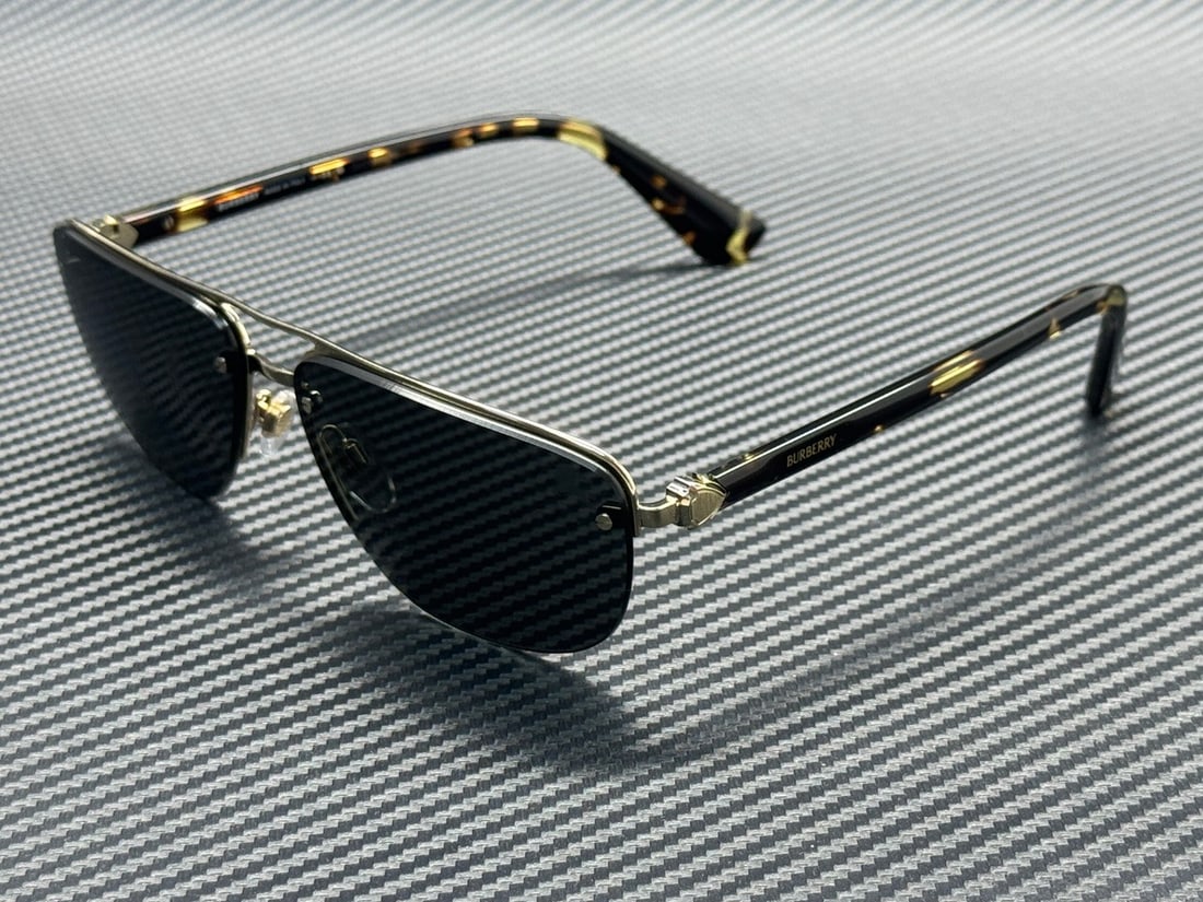 Burberry BE3164 110987 Gold Frame Grey Lenses Sunglasses: Burberry BE3164 110987 Gold Frame Grey Lenses Sunglasses Elevate your accessory game with these Burberry BE3164 sunglasses, designed specifically for men. Featuring a luxurious gold frame that perfect