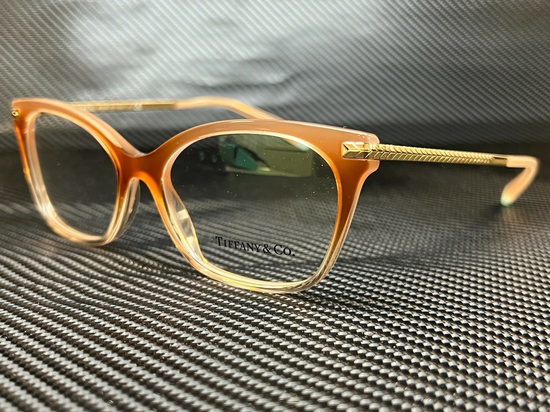 Tiffany TF2194 8299 Sand Gradient Square Eyeglasses with Demo Lens: Tiffany TF2194 8299 Sand Gradient Square Eyeglasses with Demo Lens Elevate your eyewear collection with these stunning Tiffany TF2194 8299 eyeglasses, featuring a sophisticated sand gradient frame. De