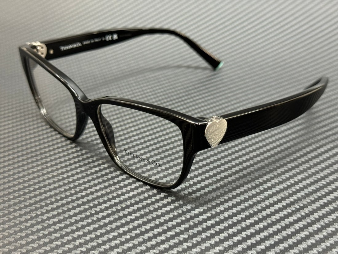 Tiffany TF2245 8001 Black Women's Eyeglasses with Authenticity Certificate: Tiffany TF2245 8001 Black Women's Eyeglasses with Authenticity Certificate Elevate your eyewear collection with these stunning Tiffany TF2245 8001 eyeglasses in a classic black frame. Designed for wom