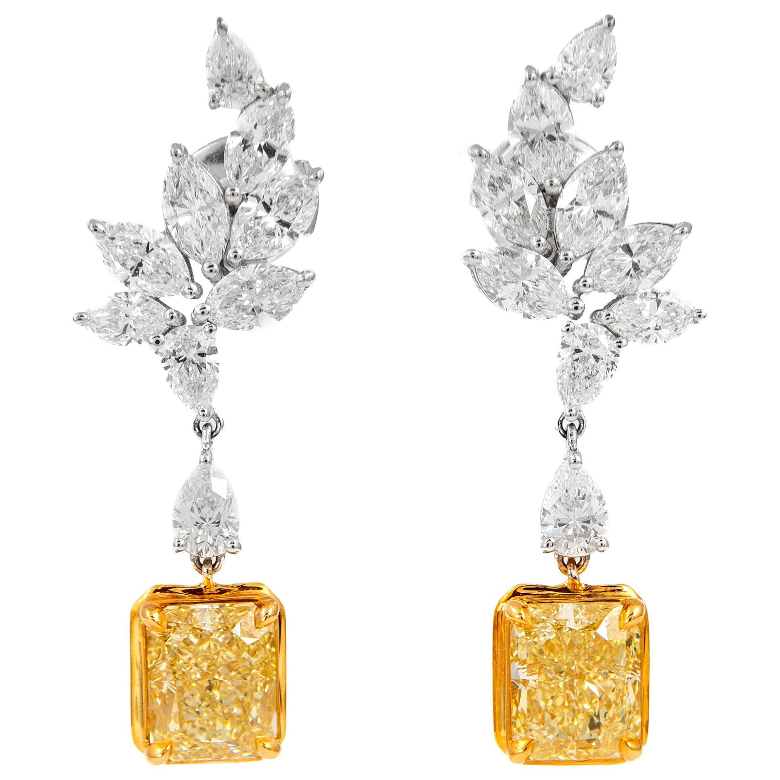 Fancy Yellow Diamond Drop Earrings 8.40ct GIA Certified 18k Gold: Fancy Yellow Diamond Drop Earrings 8.40ct GIA Certified 18k Gold Elevate your elegance with these stunning drop earrings featuring a total of 8.40 carats of GIA certified fancy yellow diamonds. The de