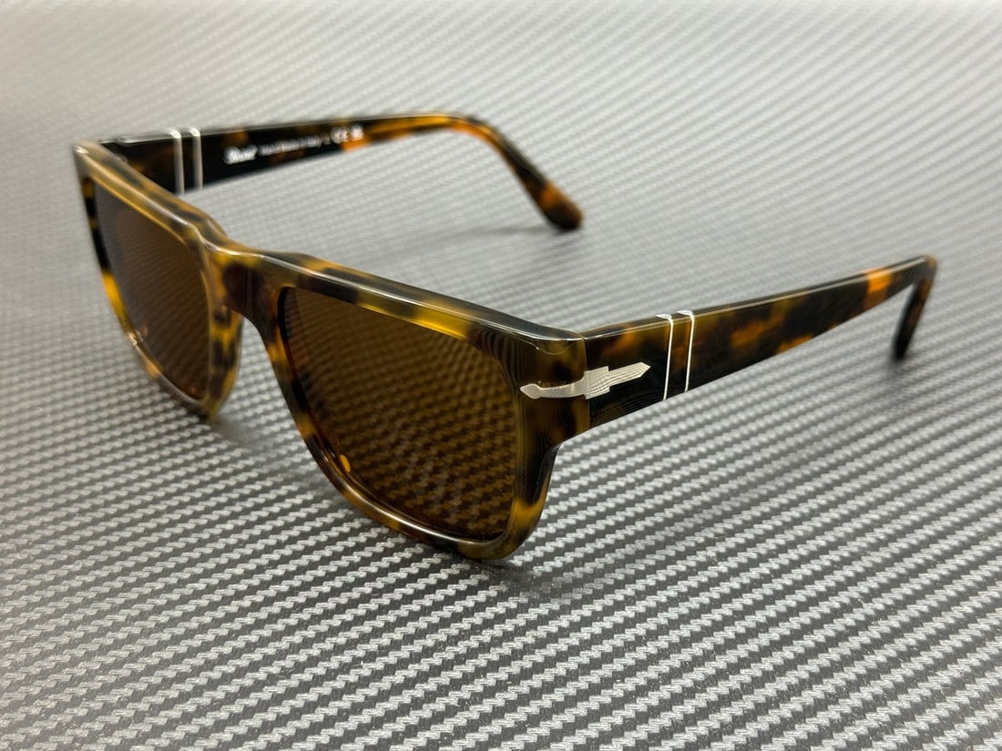 Persol PO3348S 121033 Havana Brown Unisex Sunglasses with Authenticity: Persol PO3348S 121033 Havana Brown Unisex Sunglasses with Authenticity Elevate your accessory game with the Persol PO3348S 121033 sunglasses, featuring a stylish Havana Brown frame and brown lenses. T