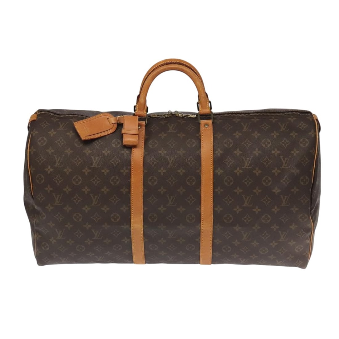 Keepall Travel Bag in Monogram Canvas by Louis Vuitton: Keepall Travel Bag in Monogram Canvas by Louis Vuitton This Louis Vuitton Keepall Bag features the iconic Monogram Canvas design in brown, crafted for unisex use. Made in France, this bag is construct