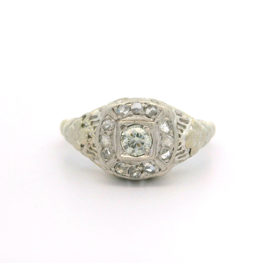 Antique Art Deco 14k White Gold Floral Diamond Ring: Antique Art Deco 14k White Gold Floral Diamond Ring This stunning Antique Art Deco ring features a combination of old rose cut diamonds set in exquisite floral filigree work, making it a perfect state