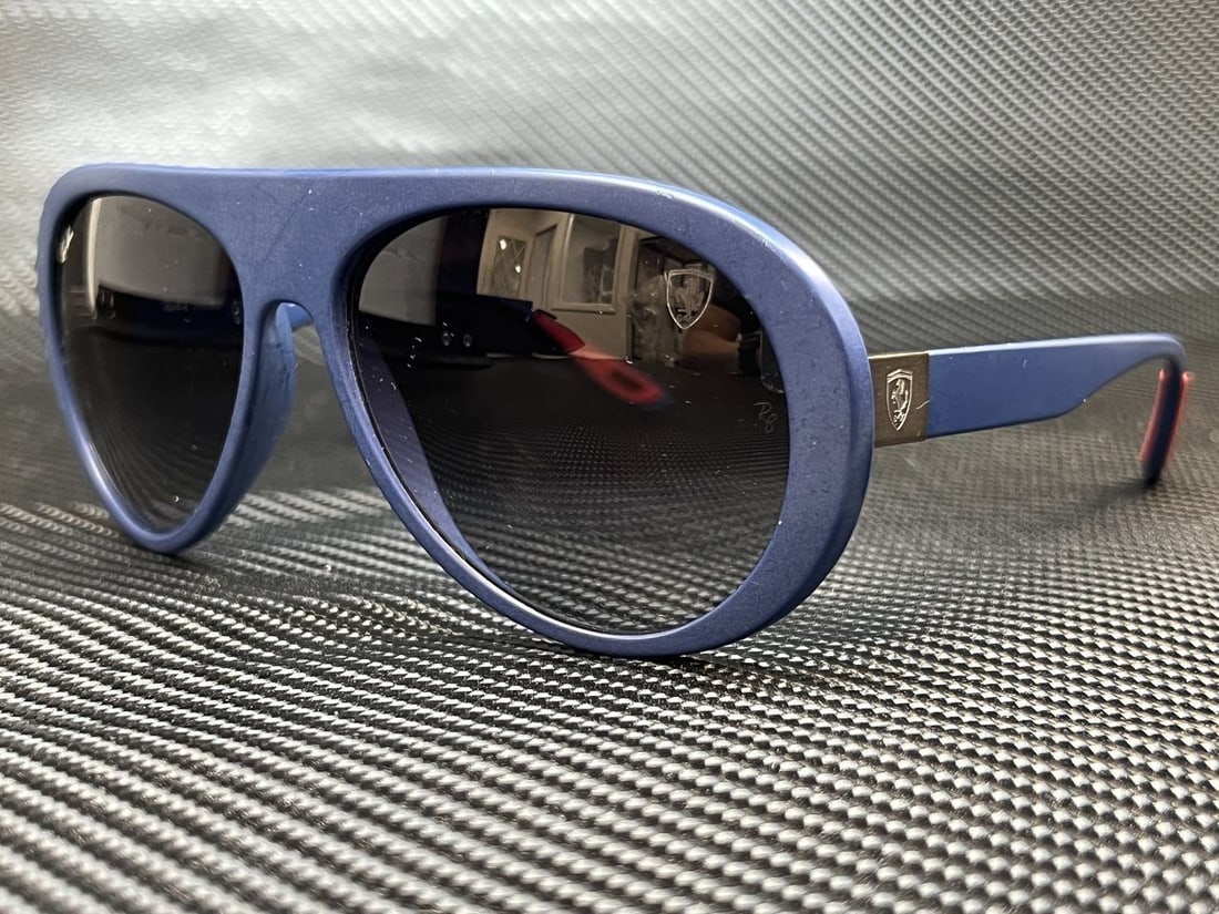 Ray-Ban RB4310M F6048G Matte Dark Blue Pilot Sunglasses 59mm: Ray-Ban RB4310M F6048G Matte Dark Blue Pilot Sunglasses 59mm Elevate your style with these Ray-Ban RB4310M F6048G Matte Dark Blue Pilot sunglasses, designed for men. Featuring a sleek matte dark blue