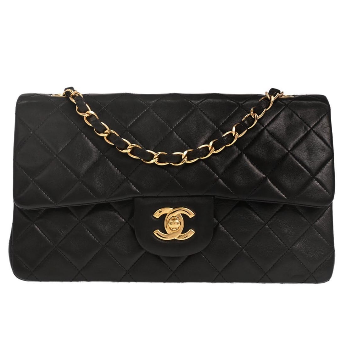 Small Black Classic Double Flap Shoulder Bag by Chanel Lambskin Leather: Small Black Classic Double Flap Shoulder Bag by Chanel Lambskin Leather This Chanel Classic Double Flap shoulder bag is crafted from black lambskin leather and features the iconic matelasse pattern. T