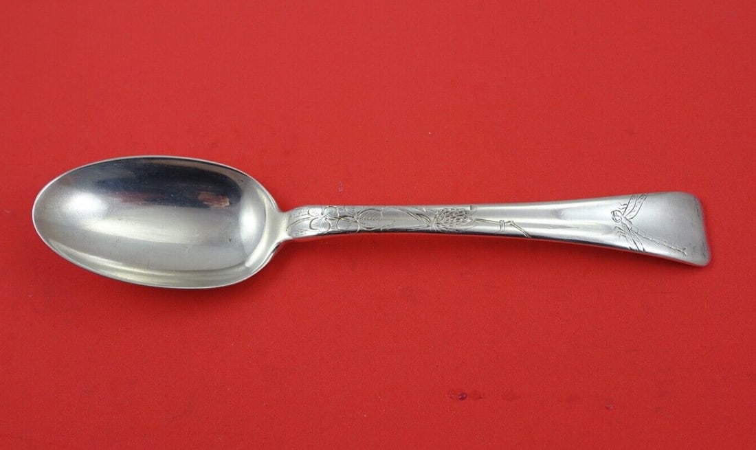 Tiffany Sterling Silver Serving Spoon Lap Over Edge Dragonfly 8 5/8": Tiffany Sterling Silver Serving Spoon Lap Over Edge Dragonfly 8 5/8" This exquisite serving spoon, crafted by Tiffany & Co., features the elegant Lap Over Edge pattern and showcases a beautifully etch