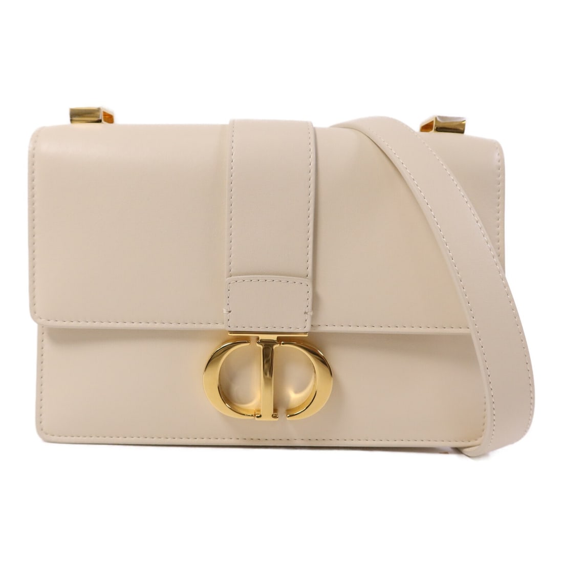 Dior 30 Montaigne Small Beige Calfskin Shoulder Bag with Gold Hardware: Dior 30 Montaigne Small Beige Calfskin Shoulder Bag with Gold Hardware This Christian Dior 30 Montaigne small shoulder bag is crafted from calfskin leather in an elegant ivory shade. Featuring a struc