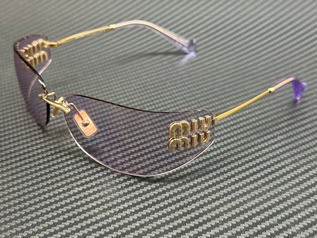 Miu Miu MU A51S ZVN90O Pale Gold Pink Women's Sunglasses with Authenticity: Miu Miu MU A51S ZVN90O Pale Gold Pink Women's Sunglasses with Authenticity Elevate your accessory collection with these stunning Miu Miu MU A51S ZVN90O sunglasses. Featuring a chic pale gold frame com