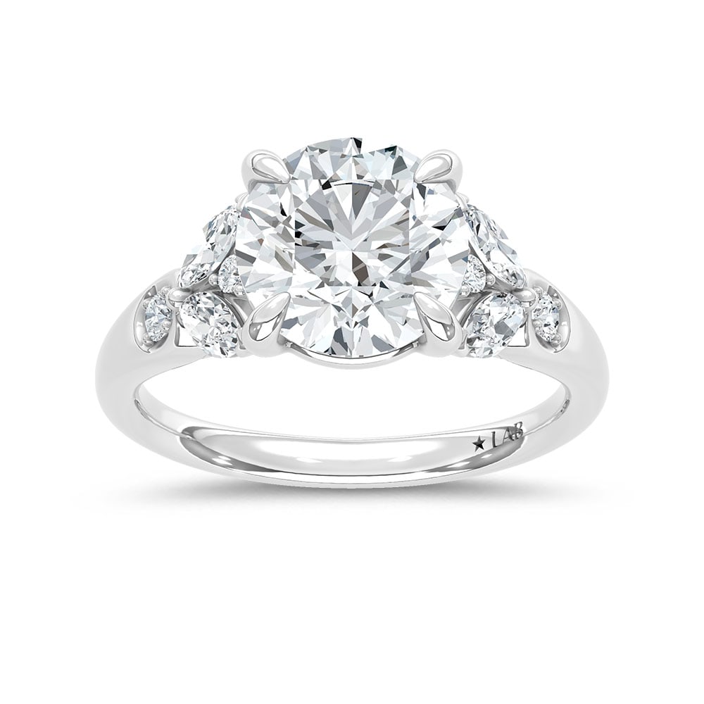 14K White Gold Lab Grown Diamond 3 1/2 Ct.Tw. Round Shape Engagement Ring (IGI Certified Center 3ct): 14K White Gold Lab Grown Diamond 3 1/2 Ct.Tw. Round Shape Engagement Ring (IGI Certified Center 3ct) 14k White Gold Stone Color: D-f Stone Clarity: Vs Each ring is presented in standard size 6.5. Comp