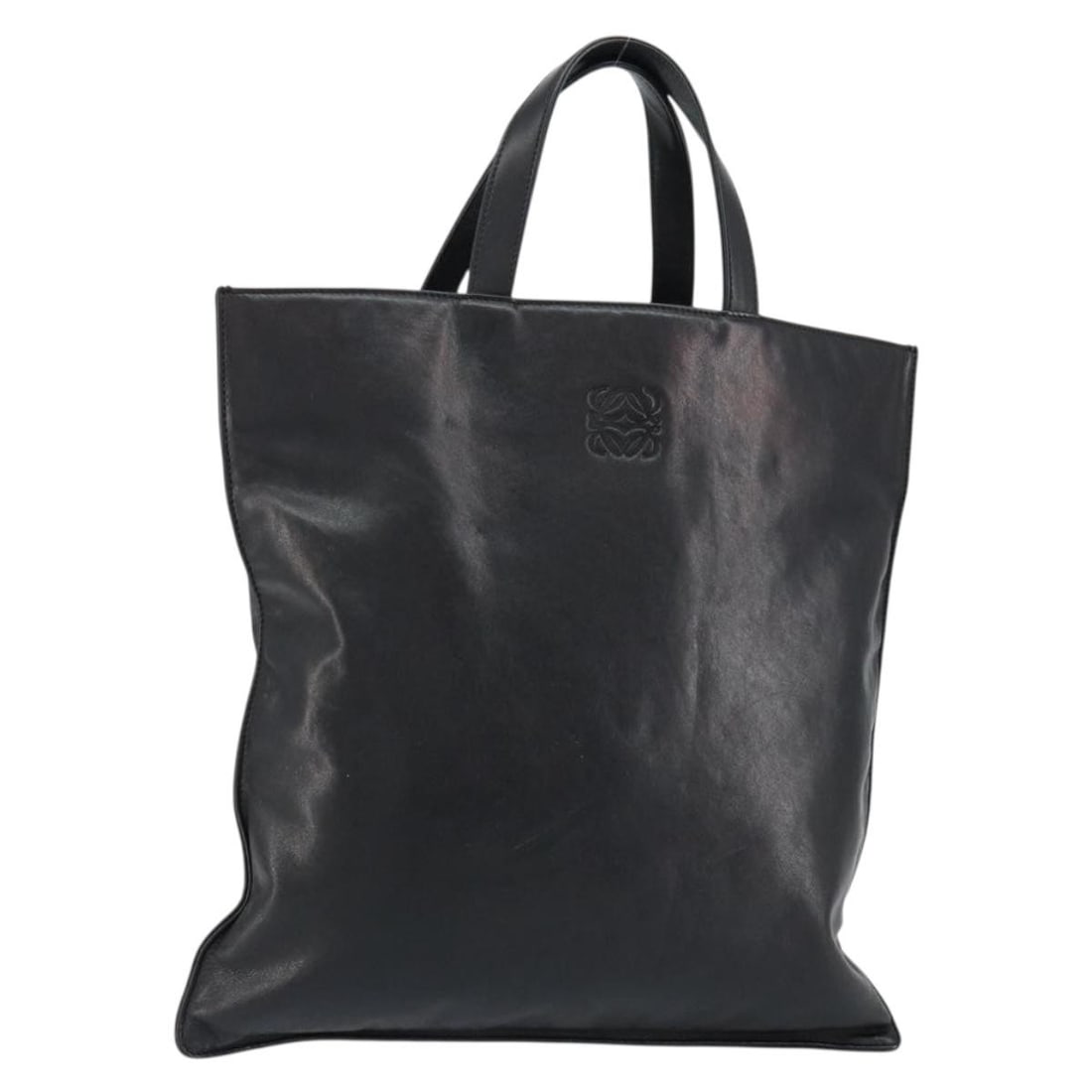 Vintage Black Leather Tote Bag by Loewe 32cm: Vintage Black Leather Tote Bag by Loewe 32cm This vintage Loewe Anagram tote bag is crafted from black leather and designed for women. It features a clean pre-owned condition with minor surface wear,