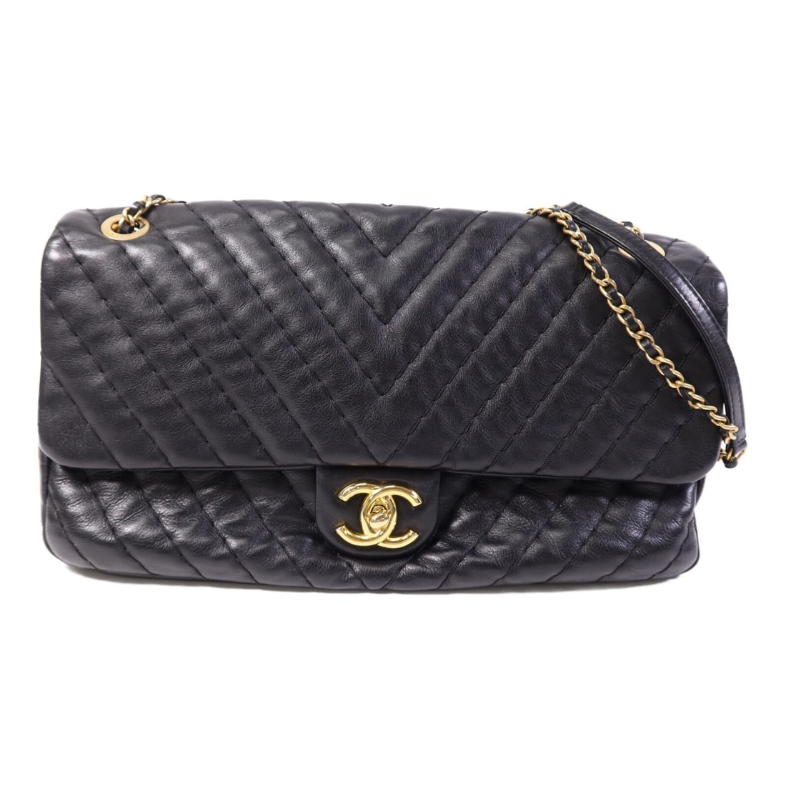 Black Calfskin Leather CHANEL CC Gold Chain Shoulder Bag: Black Calfskin Leather CHANEL CC Gold Chain Shoulder Bag This CHANEL shoulder bag is crafted from black calfskin leather and features the iconic CC logo with a chain strap. The bag is designed in a re