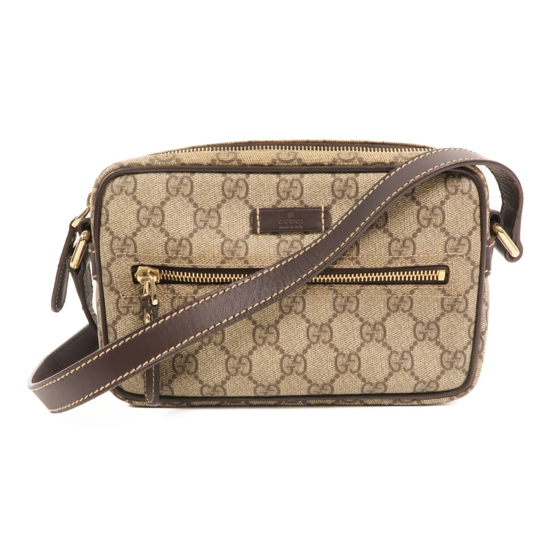 Brown GG Canvas Gucci Shoulder Bag with Gold Hardware: Brown GG Canvas Gucci Shoulder Bag with Gold Hardware This Gucci GG shoulder bag features a brown GG canvas exterior and is designed for women. Made in Italy, the bag offers a stylish and versatile lo