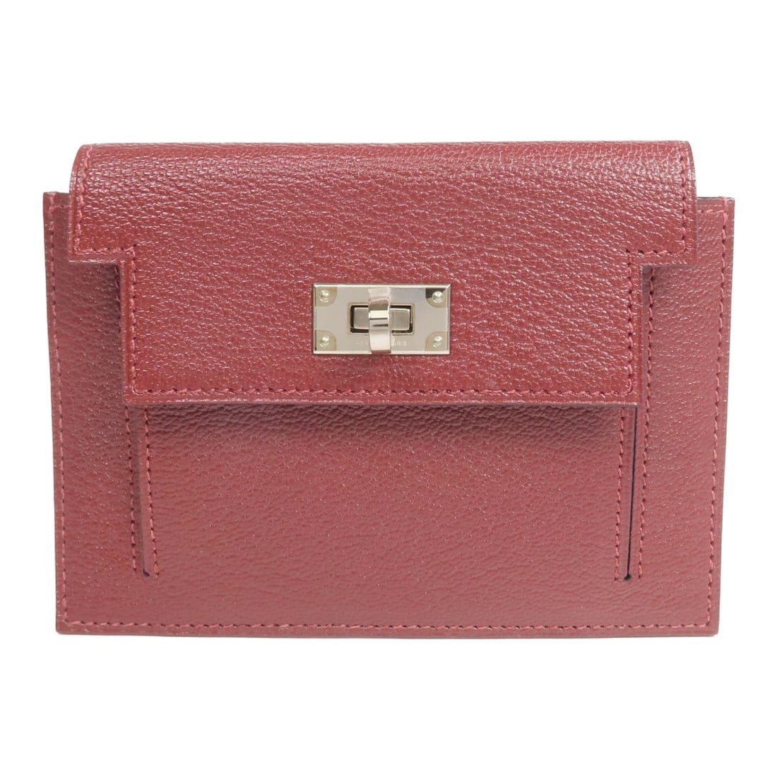 Kelly Pocket Compact Red Goatskin Coin Purse with Palladium Hardware: Kelly Pocket Compact Red Goatskin Coin Purse with Palladium Hardware This Hermes Kelly Pocket Compact coin purse is crafted from red goatskin leather and features palladium hardware. Designed for wome