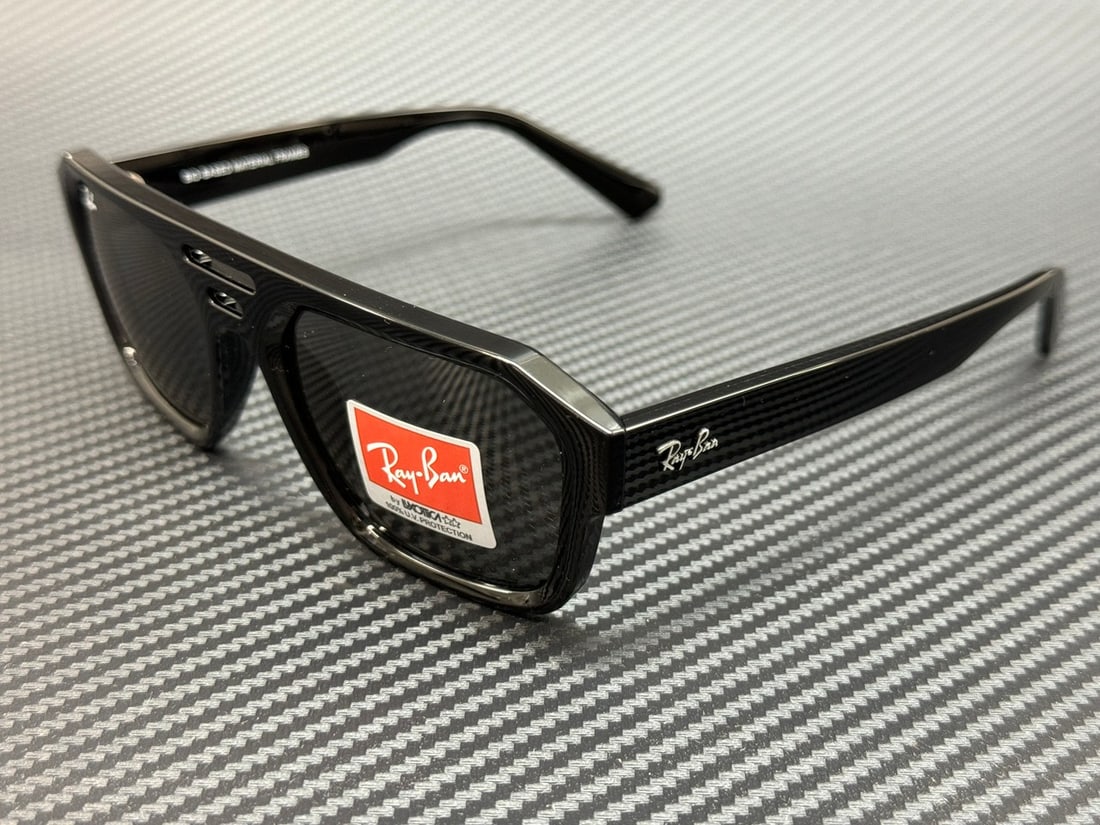 Ray-Ban RB4397 667787 Black Grey Unisex Sunglasses with Authenticity Certificate: Ray-Ban RB4397 667787 Black Grey Unisex Sunglasses with Authenticity Certificate Discover the stylish Ray-Ban RB4397 sunglasses, designed for unisex wear. Featuring a classic black frame complemented