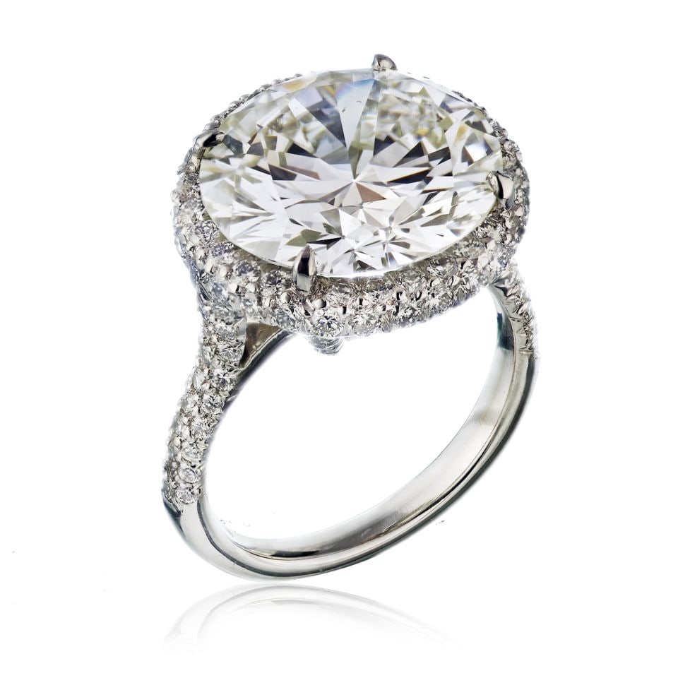 GIA Certified 9.05ct Round Diamond Platinum Engagement Ring: GIA Certified 9.05ct Round Diamond Platinum Engagement Ring This exquisite engagement ring showcases a stunning 9.05 carat round brilliant cut diamond, certified by GIA, offering enchanting brilliance