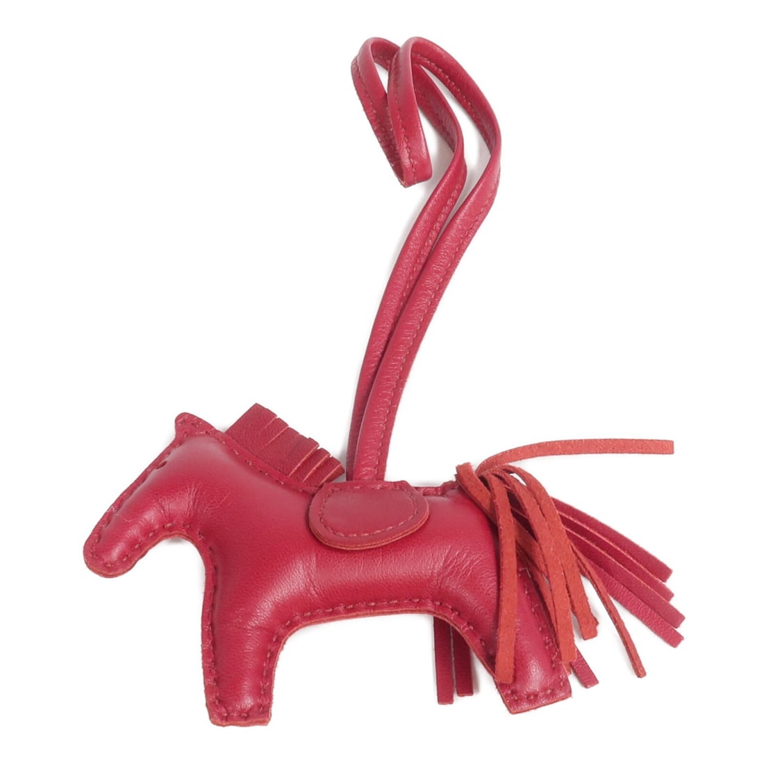 Hermes Rodeo PM Red Lambskin Horse Bag Charm: Hermes Rodeo PM Red Lambskin Horse Bag Charm This HERMES Rodeo PM Charm is crafted from soft lambskin leather in a striking red hue. Designed as a stylish accessory, it is suitable for women and made