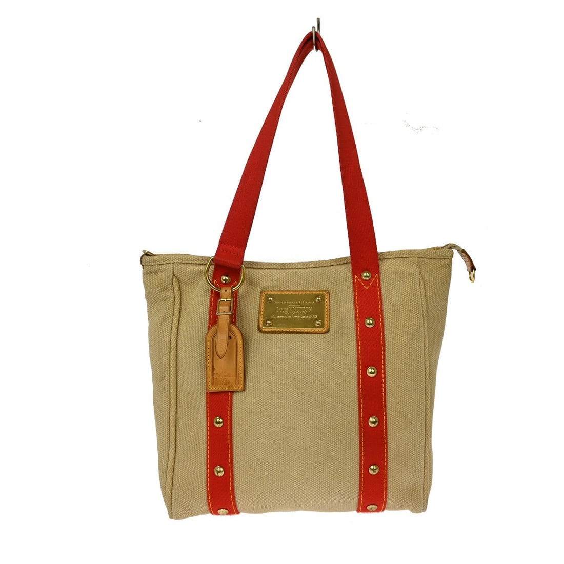 Louis Vuitton Antigua Cabas MM Beige Canvas Medium Tote Bag M40035: Louis Vuitton Antigua Cabas MM Beige Canvas Medium Tote Bag M40035 This Louis Vuitton Antigua Cabas MM tote bag features a beige canvas exterior with double handles and red accents. The medium-sized t
