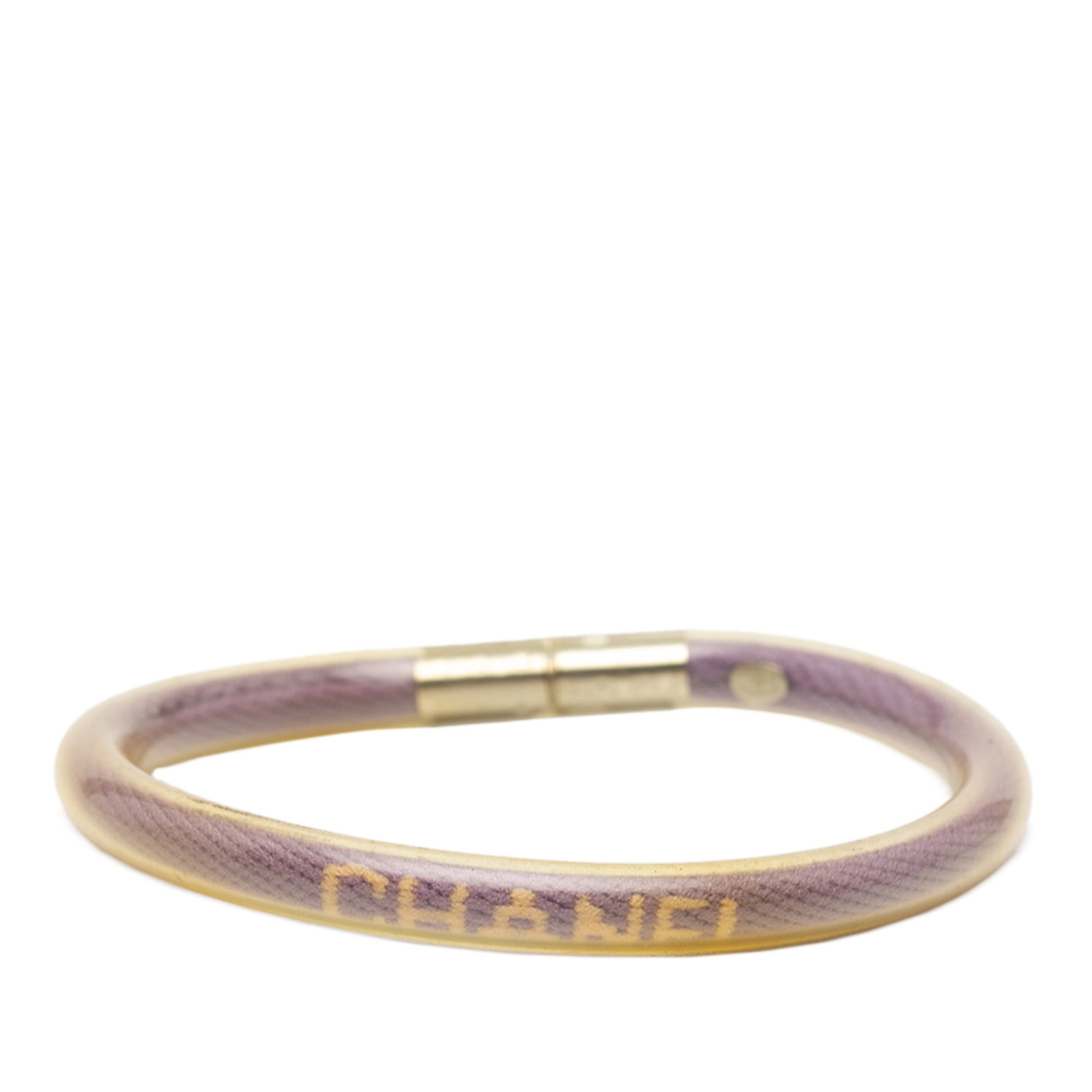 Chanel Sport Line Purple Vinyl Tube Bracelet with Logo and Metal Twist Lock: Chanel Sport Line Purple Vinyl Tube Bracelet with Logo and Metal Twist Lock This Chanel bracelet from the Sport Line collection features a vinyl plated body in purple and a metal twist lock closure. T