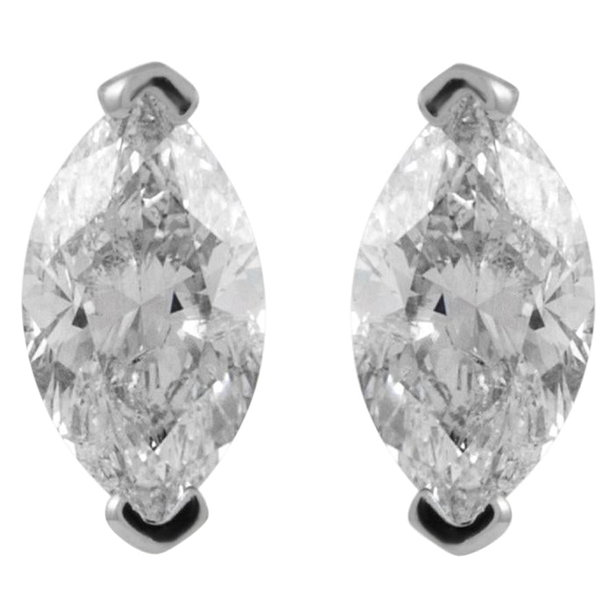 EGL Certified 1.41ct Marquise Diamond Studs in 14k White Gold: EGL Certified 1.41ct Marquise Diamond Studs in 14k White Gold Elevate your elegance with these exquisite 14k white gold marquise diamond stud earrings. Each earring features a stunning marquise-cut di