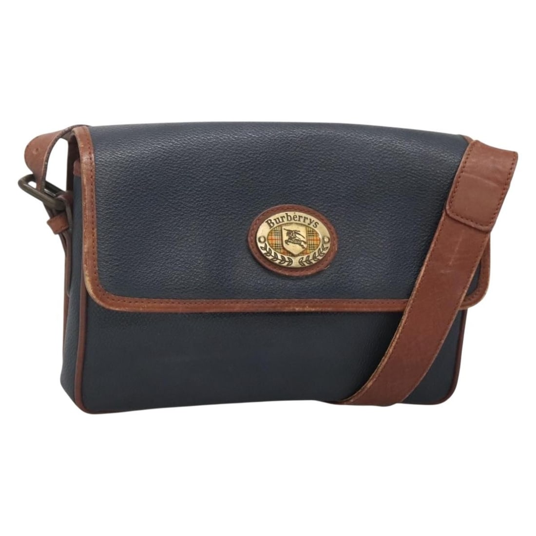 Burberrys Navy Gold PVC Leather Shoulder Bag with Adjustable Strap: Burberrys Navy Gold PVC Leather Shoulder Bag with Adjustable Strap This Burberrys shoulder bag is crafted from durable PVC leather in a stylish navy and gold color combination. Designed for everyday u