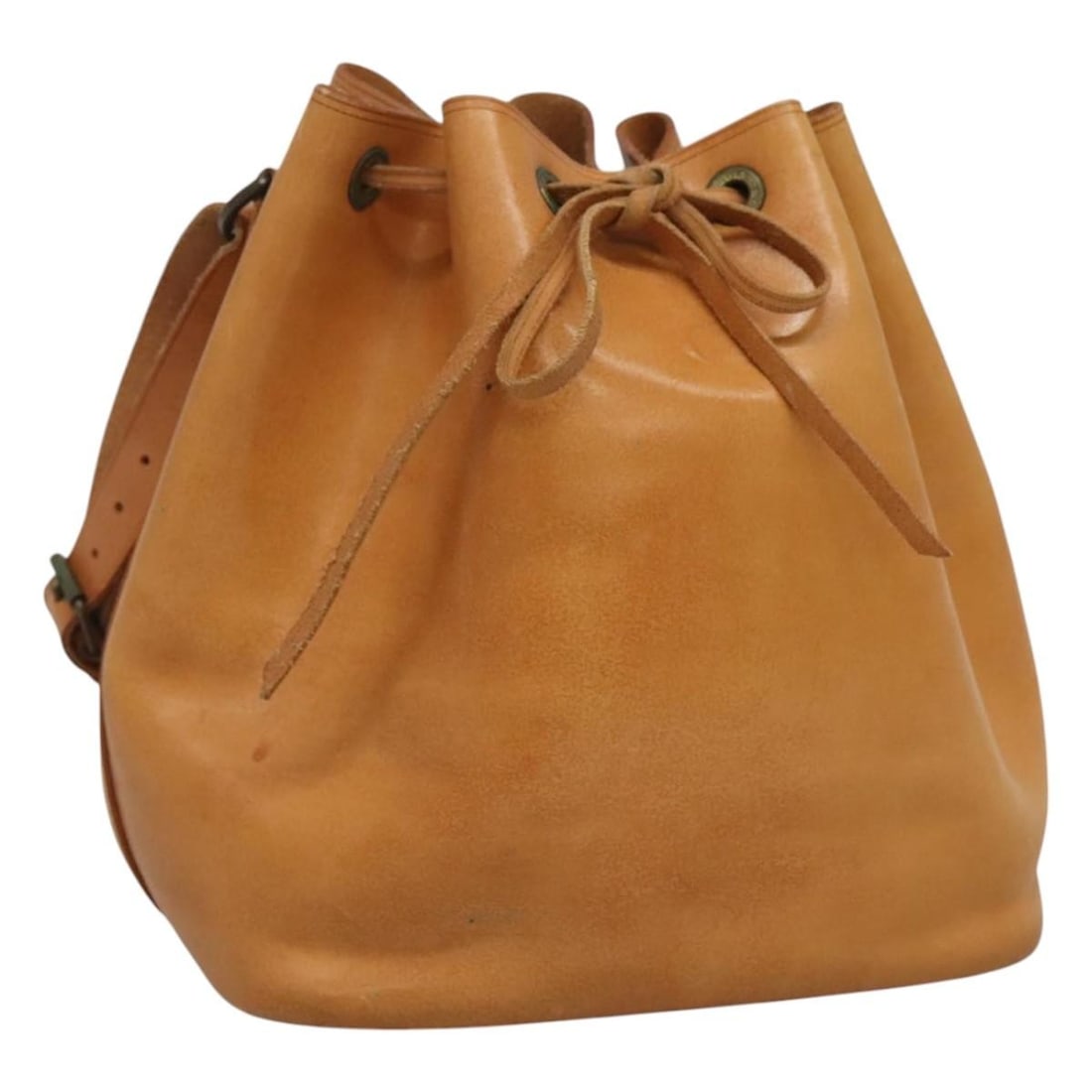 Louis Vuitton Petit Noe Nomade Leather Beige Shoulder Bag M85003 France: Louis Vuitton Petit Noe Nomade Leather Beige Shoulder Bag M85003 France This Louis Vuitton Petit Noe shoulder bag is crafted from beige Nomade leather and is designed for women. The bag shows signs of