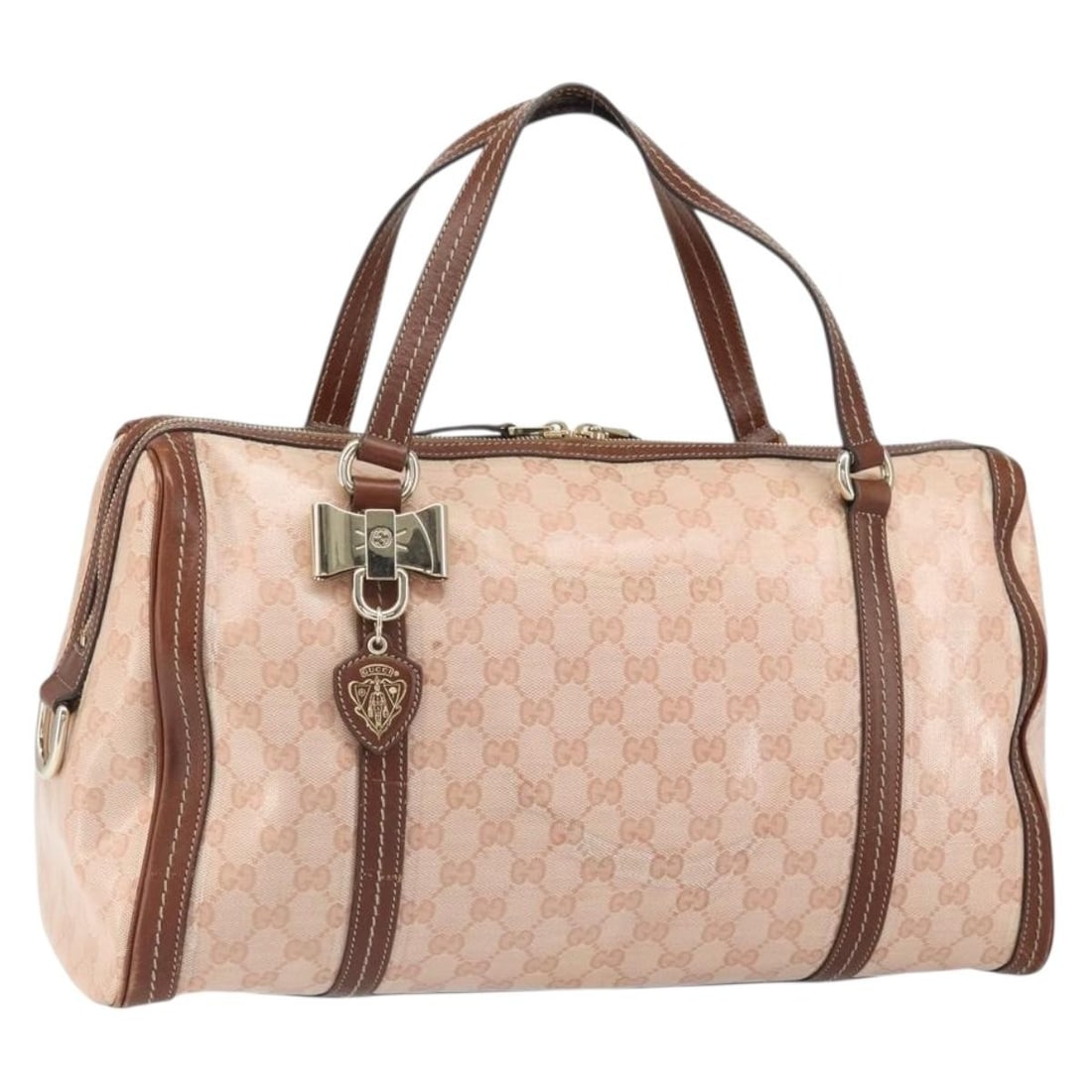 Gucci Boston Bag GG Crystal Pink Gold Coated Canvas Model 181488: Gucci Boston Bag GG Crystal Pink Gold Coated Canvas Model 181488 This GUCCI GG Crystal Boston Bag features a pink and gold coated canvas exterior with the signature GG canvas design. The bag is design