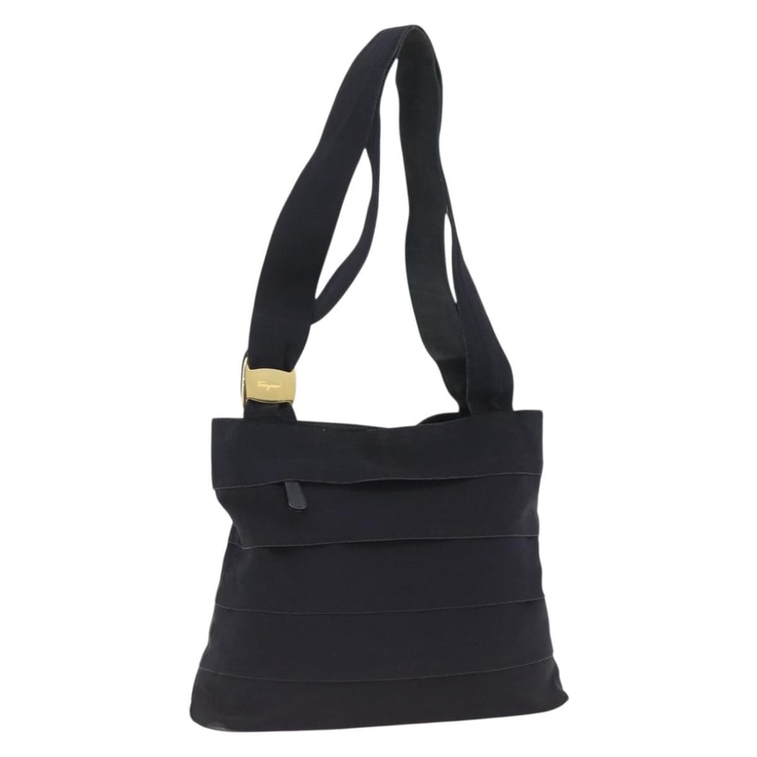 Navy Canvas Tote by Salvatore Ferragamo Gold Accents Italian Made: Navy Canvas Tote by Salvatore Ferragamo Gold Accents Italian Made This Salvatore Ferragamo tote bag is crafted from navy and gold canvas. Designed for women, it features a spacious main compartment an